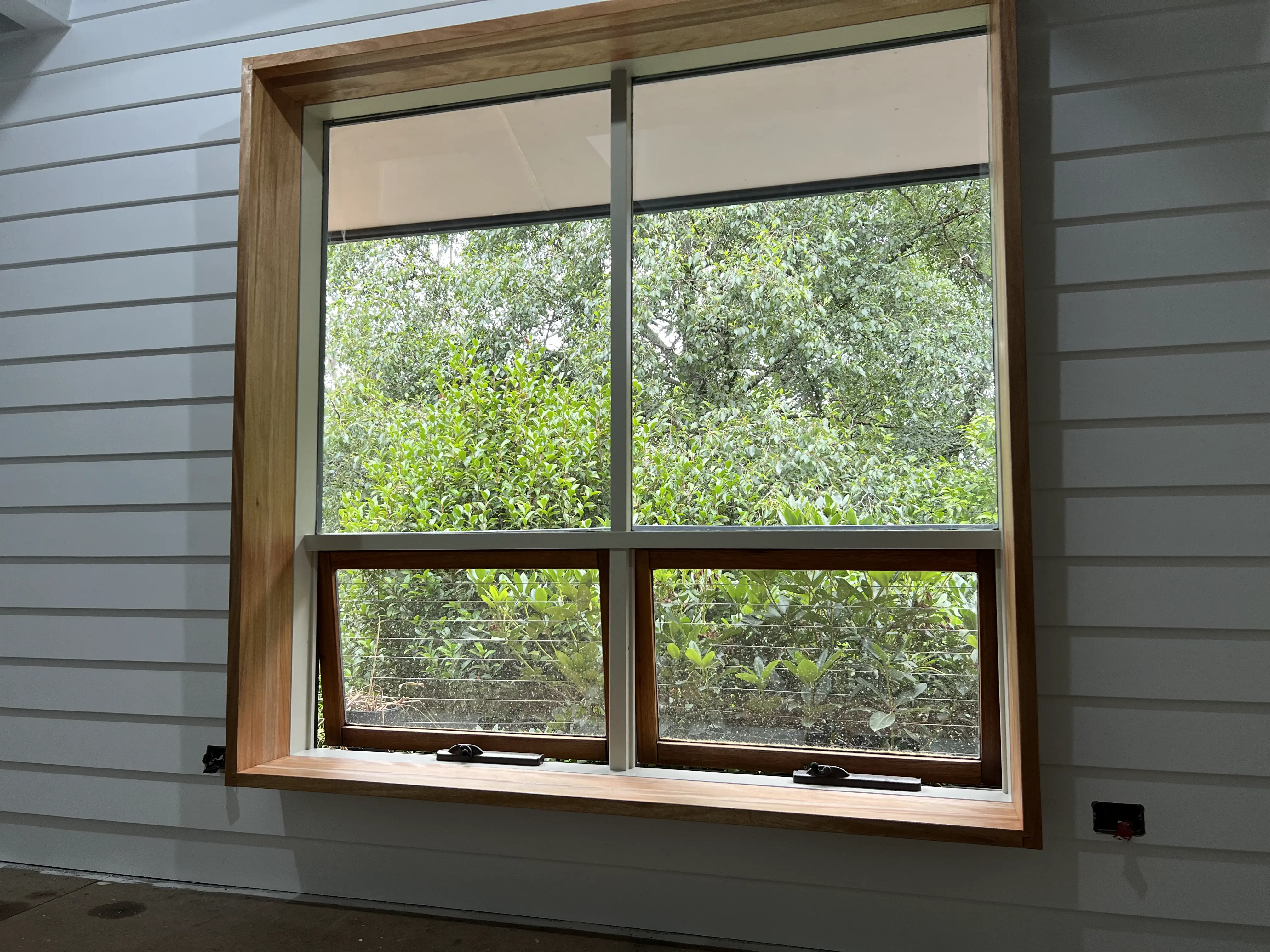 Deep timber reveal around large window